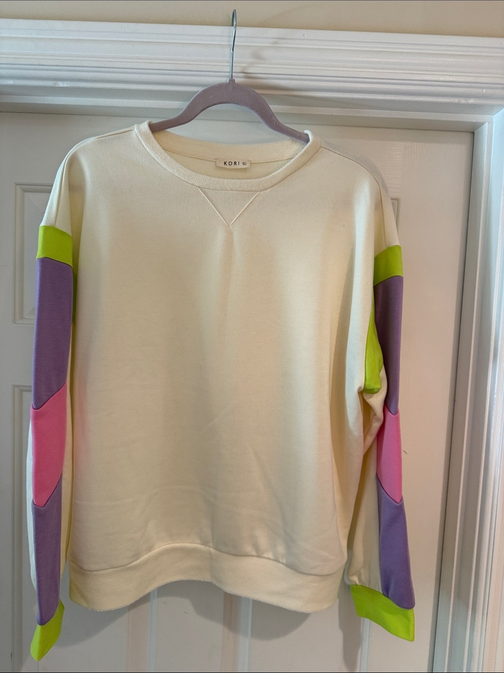 KORI Cream Crewneck Sweatshirt with color lock Pink, Purple & Lime Sleeves NWOT